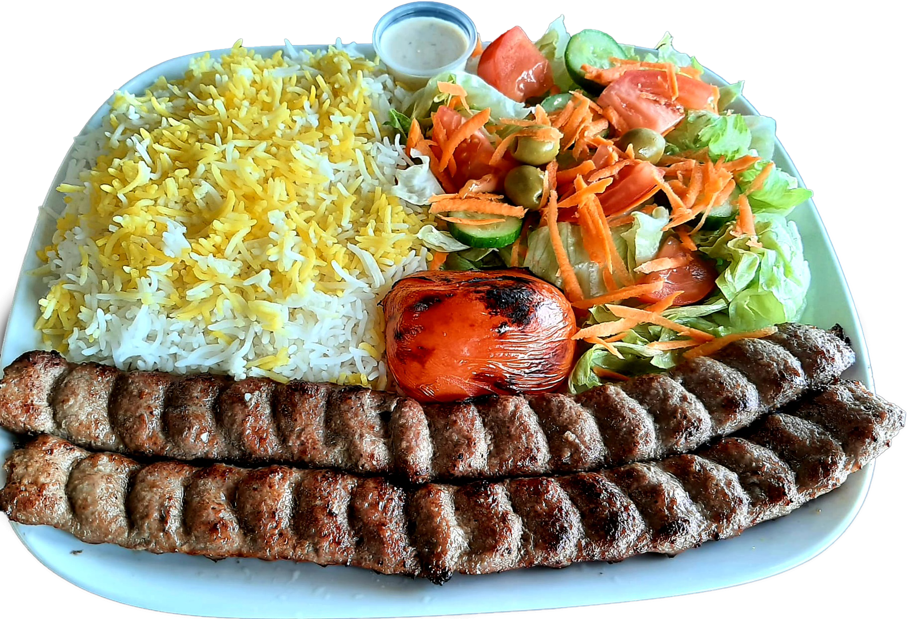 beef kebab with rice, salad, and grilled tomatoes